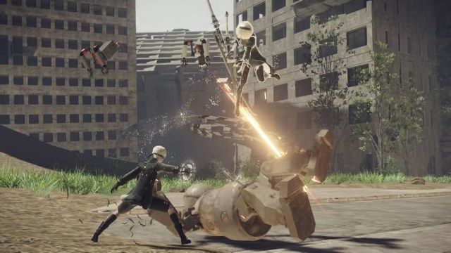 Nier Automata screenshot of 2B and 9S attacking a robot 