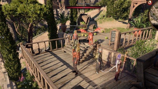 bg3 screenshot of Nesha Leesha standing on a deck in front of a tavern