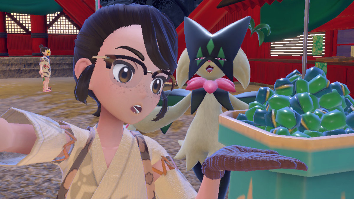 A selfie-style screenshot of the protagonist pretending to eat berries with a Meowscarada in Pokémon Scarlet & Violet: The Teal Mask.