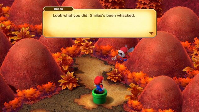 A Super Mario RPG screenshot of Mario speaking to Beezos after defeating Megasmilax.